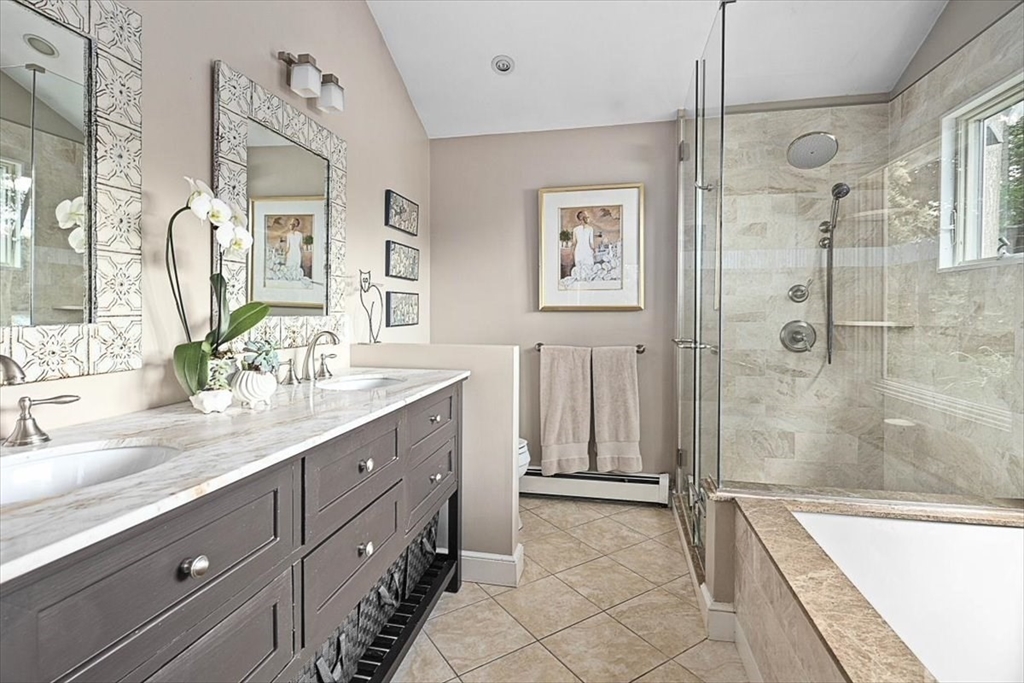 25 Howland Lane Hingham, MA 02043 - Photo 23 of 34 a spacious bathroom with a granite countertop sink mirror and shower