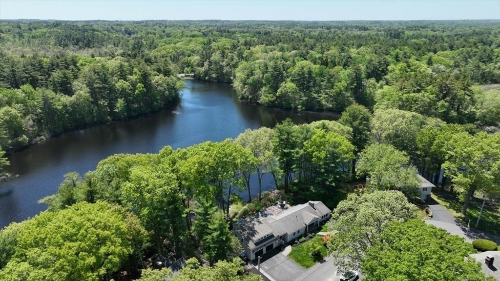 25 Howland Lane Hingham, MA 02043 - Photo 34 of 34 an aerial view of green landscape with trees houses and lake view