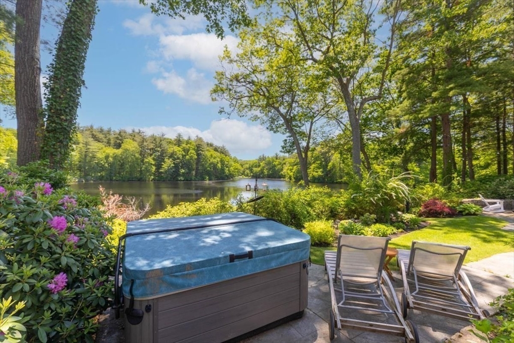25 Howland Lane Hingham, MA 02043 - Photo 5 of 34 a view of a swimming pool with lounge chairs