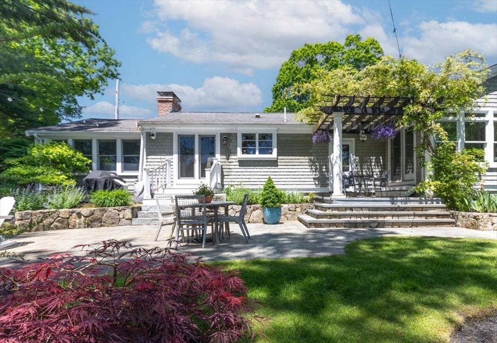 25 Howland Lane Hingham, MA 02043 - Photo 8 of 34 a view of a house with a patio