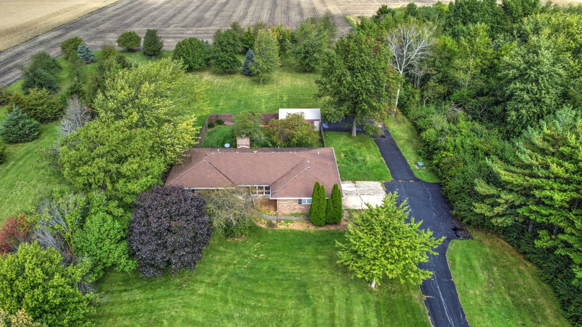 1950 Scully Road Dwight, IL 60420 - Photo 1 of 15 a aerial view of a house with yard and green space