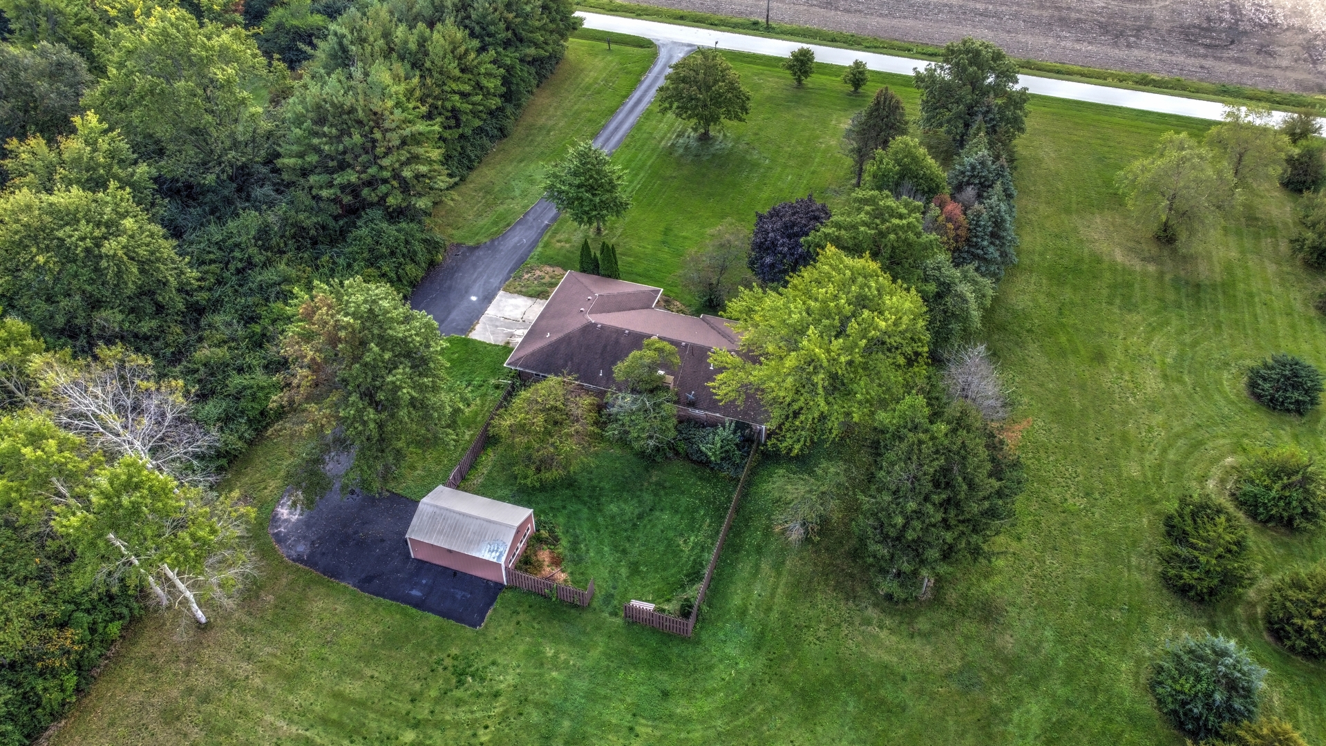 1950 Scully Road Dwight, IL 60420 - Photo 6 of 15 a view of a garden with a bench in garden