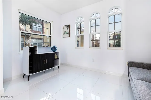 a view of workspace with a window and cabinet