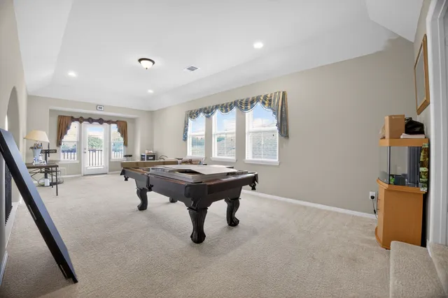 a room with furniture and a window