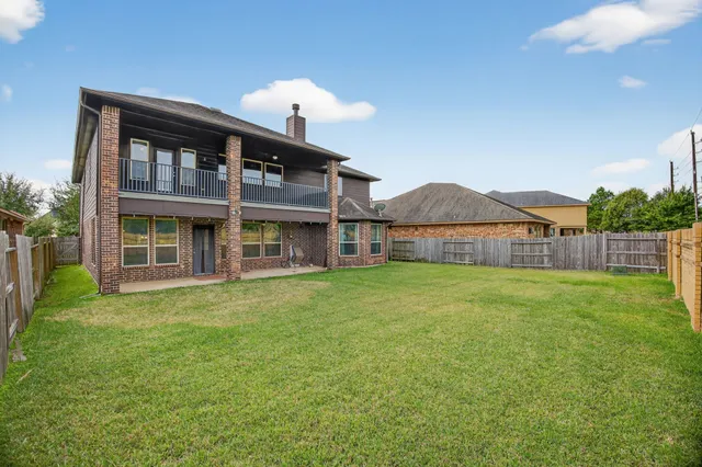 a view of a house with a garden