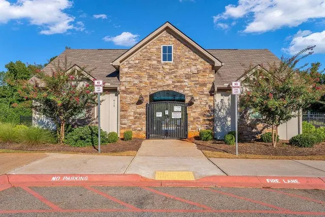 a front view of a house with yard