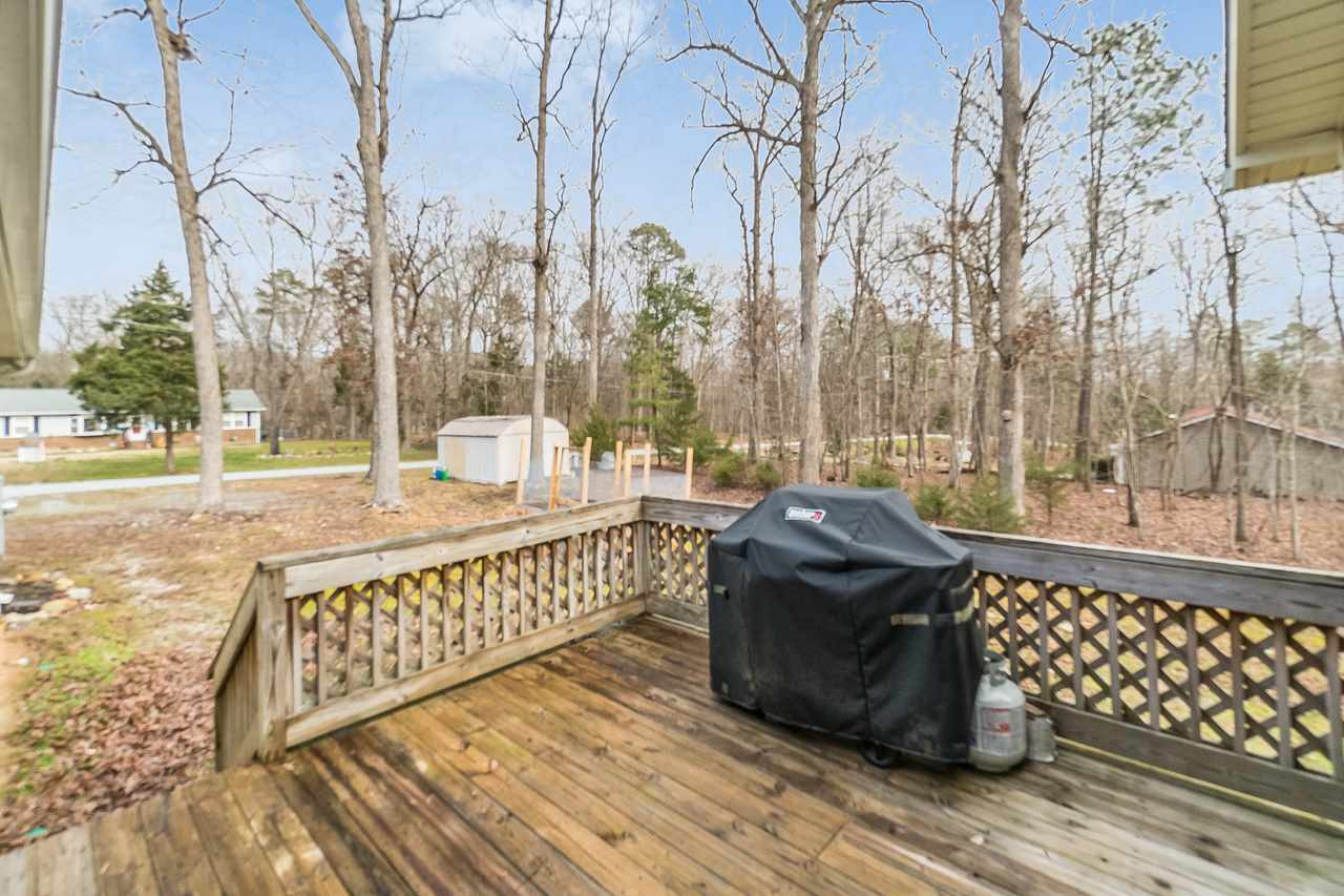 5712 Novaglen Road Durham, NC 27712 - Photo 21 of 27 Back deck for grilling and enjoying the scenery! Patio/Deck