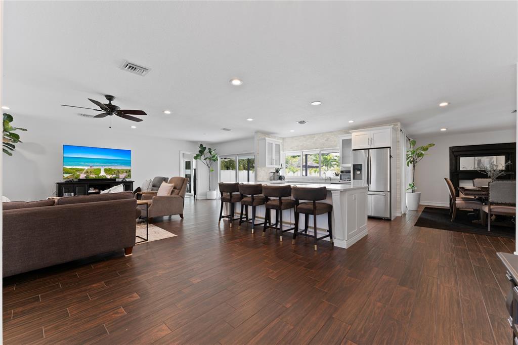 22111 Serenata Circle West Boca Raton, FL 33433 - Photo 5 of 18 a living room with furniture and a wooden floor
