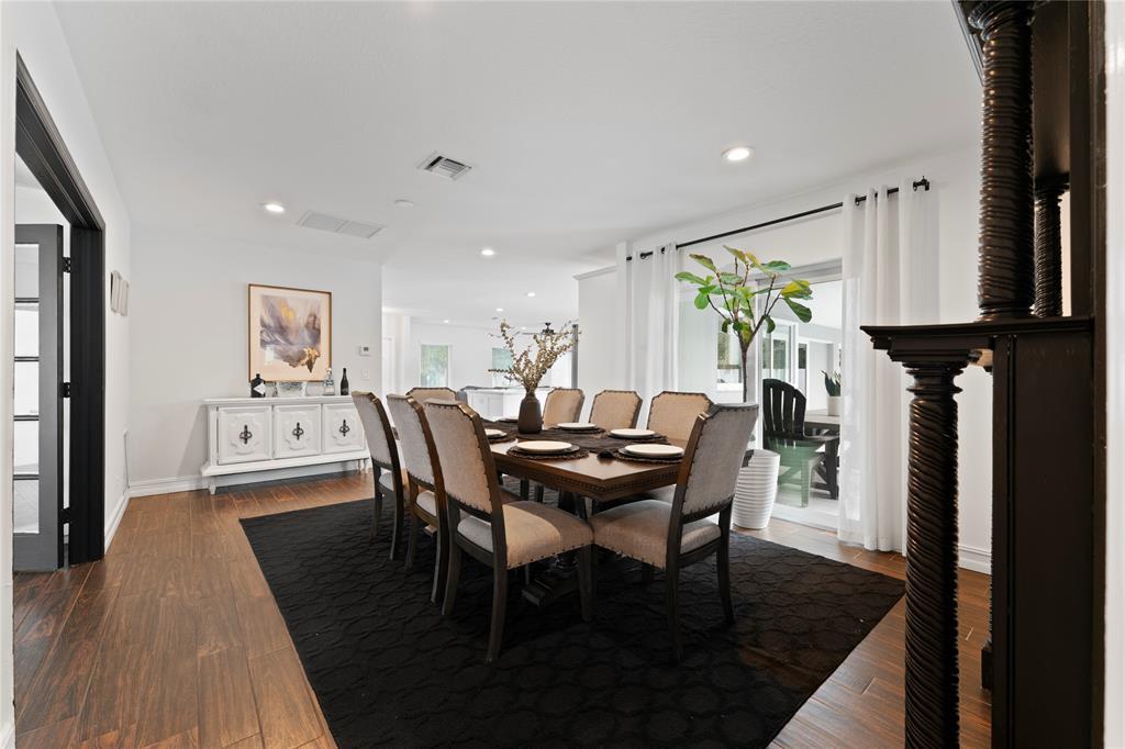 22111 Serenata Circle West Boca Raton, FL 33433 - Photo 9 of 18 a view of a dining room with furniture and a potted plant