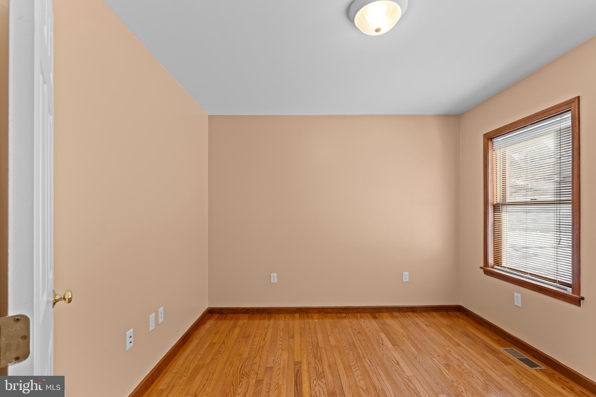 229 Cochise Trail Lock Haven, PA 17745 - Photo 15 of 48 a view of an empty room with wooden floor and a window