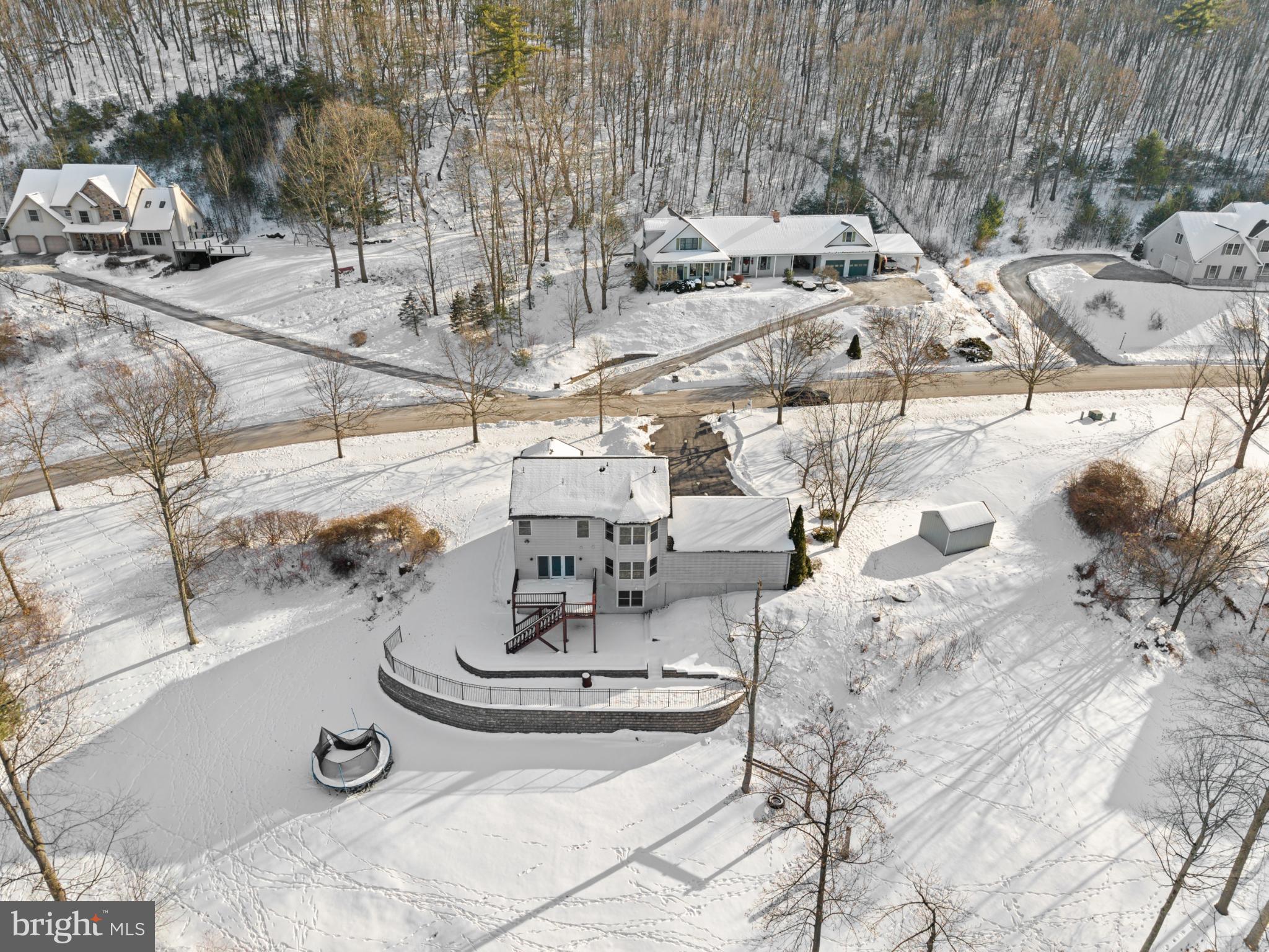 229 Cochise Trail Lock Haven, PA 17745 - Photo 3 of 48 Charming winter retreat in a snowy landscape.