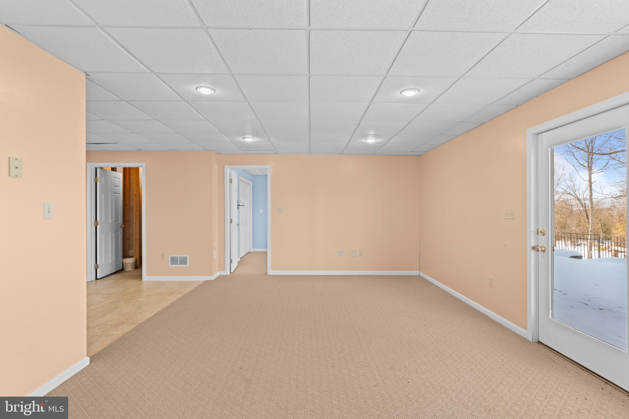 229 Cochise Trail Lock Haven, PA 17745 - Photo 41 of 48 Spacious, light-filled room with outdoor access.