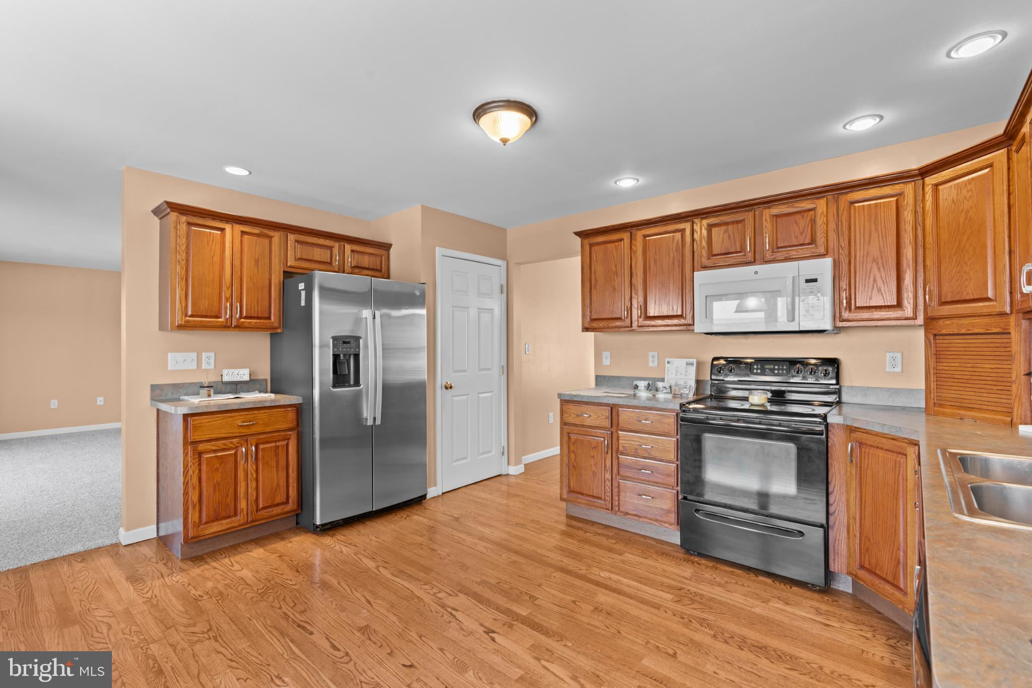 229 Cochise Trail Lock Haven, PA 17745 - Photo 6 of 48 a kitchen with stainless steel appliances granite countertop a refrigerator stove and oven