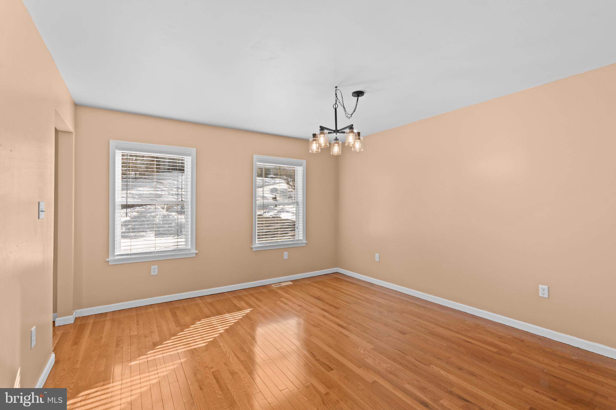 229 Cochise Trail Lock Haven, PA 17745 - Photo 10 of 48 a view of an empty room with a window and wooden floor