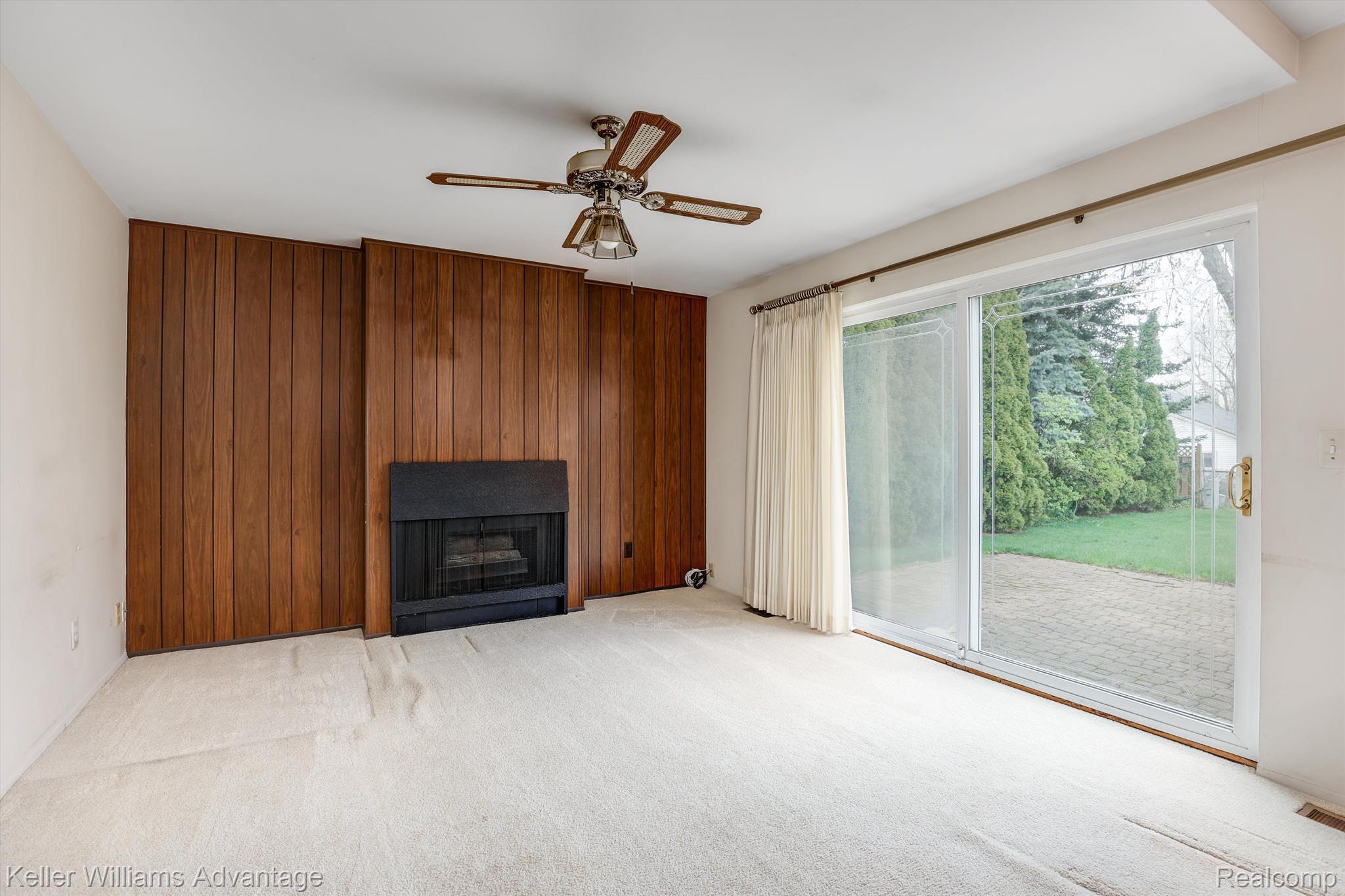 42526 Park Ridge Road Novi, MI 48375 - Photo 6 of 23 Family room has a gas fireplace