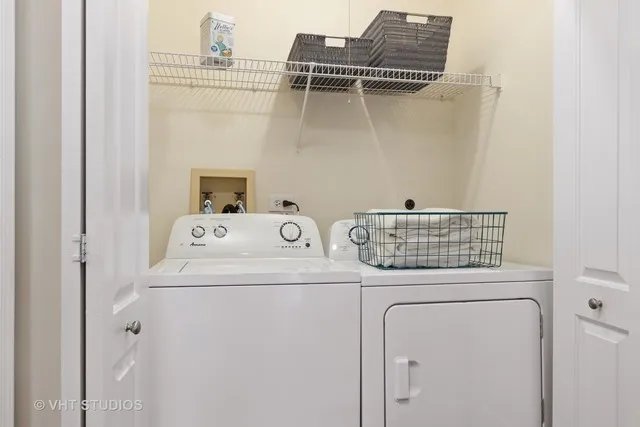 a utility room with dryer and washer