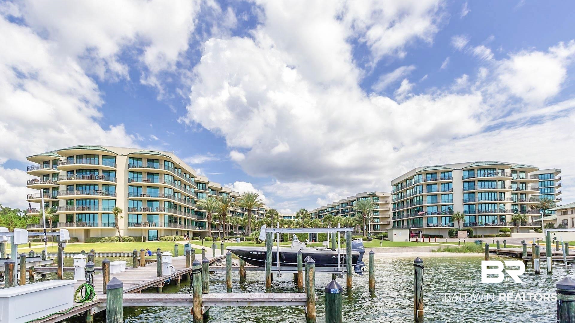 27580 Canal Road, Unit 1431 Orange Beach, AL 36561 - Photo 71 of 73 Dock featuring boat lift and a water view
