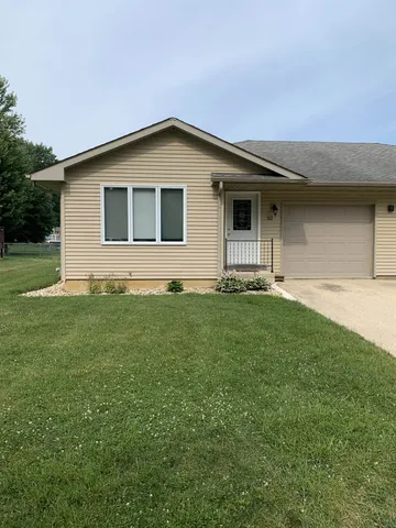 a house with garden in front of it