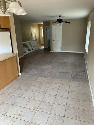 a view of a hallway with closet area