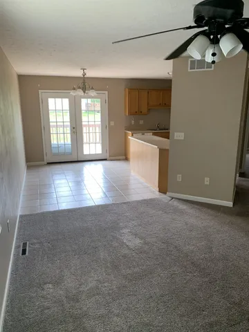 a view of a kitchen with a sink and dishwasher kitchen appliances