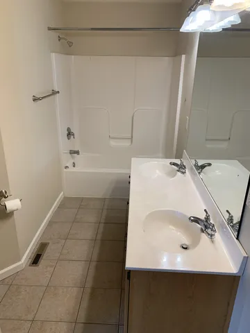 a bathroom with a sink and a tub