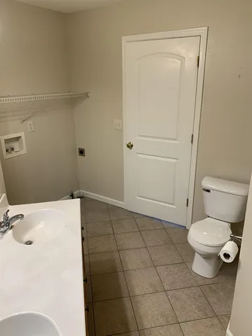 a bathroom with a toilet