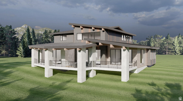 3923 East Harris Way Heber City, UT 84036 - Photo 3 of 12 Contemporary multi-level residence featuring expansive windows, prominent concrete columns, and multiple exterior balconies with dark railings