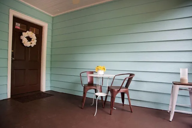a view of a chairs and table in a room