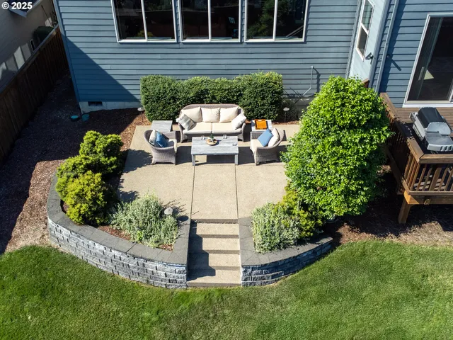 a backyard of a house with lots of green space