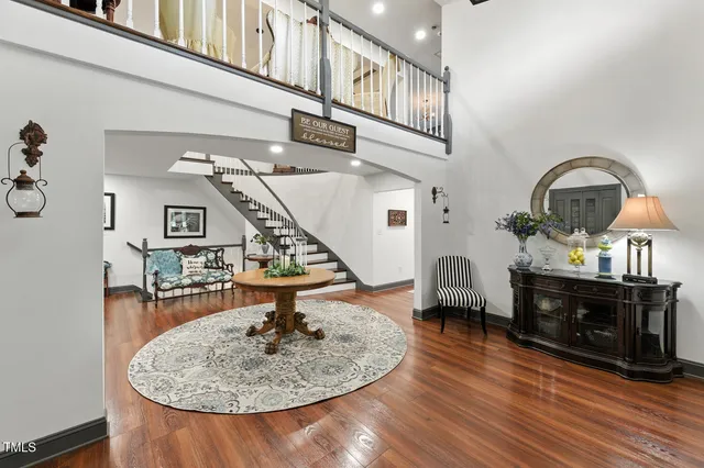 a kitchen with a refrigerator and cabinets