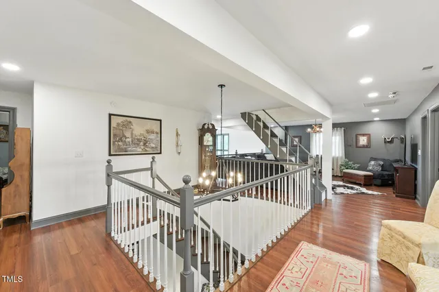 a bathroom with a sink mirror and vanity