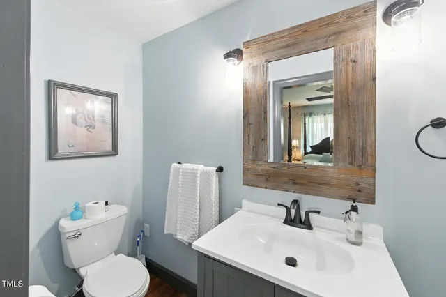 an aerial view of a residential apartment building with a yard