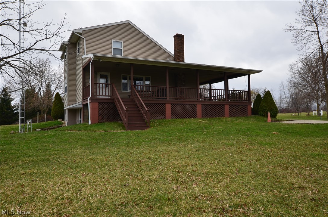 4058 Warner Road Ashtabula, OH 44004 - Photo 22 of 25 Side entry from porch and walk-out from lower level.