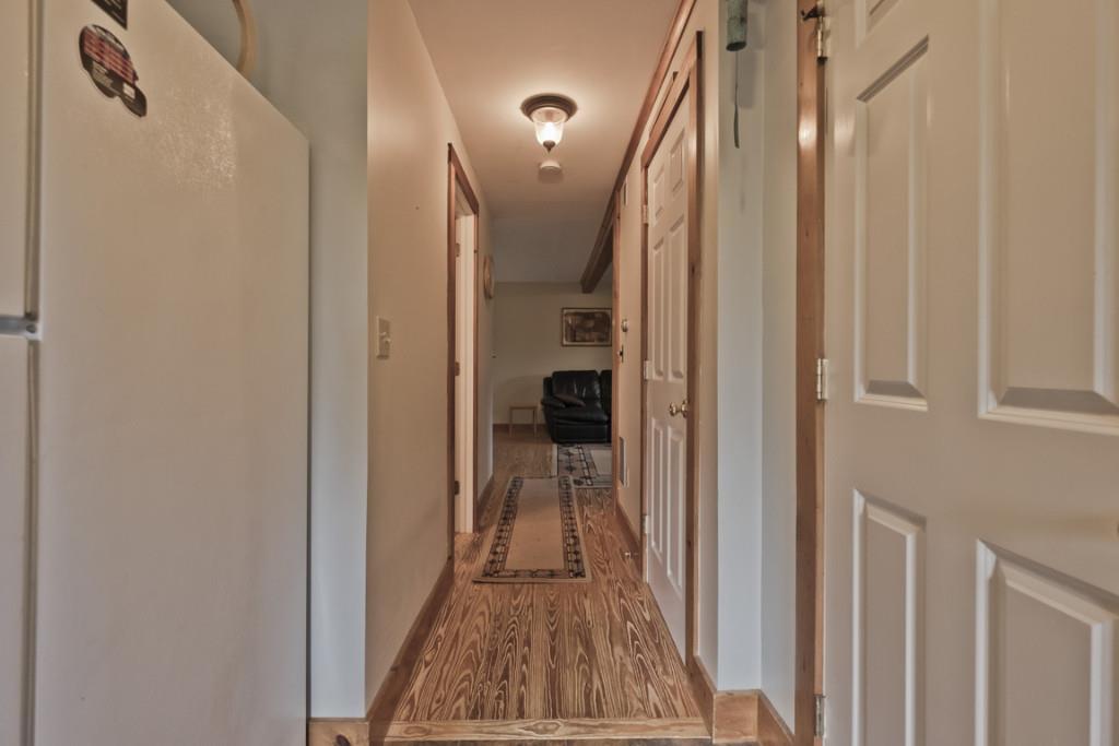 151 Black Mountain Road Harrison, ME 04040 - Photo 11 of 35 Hallway from kitchen to living room