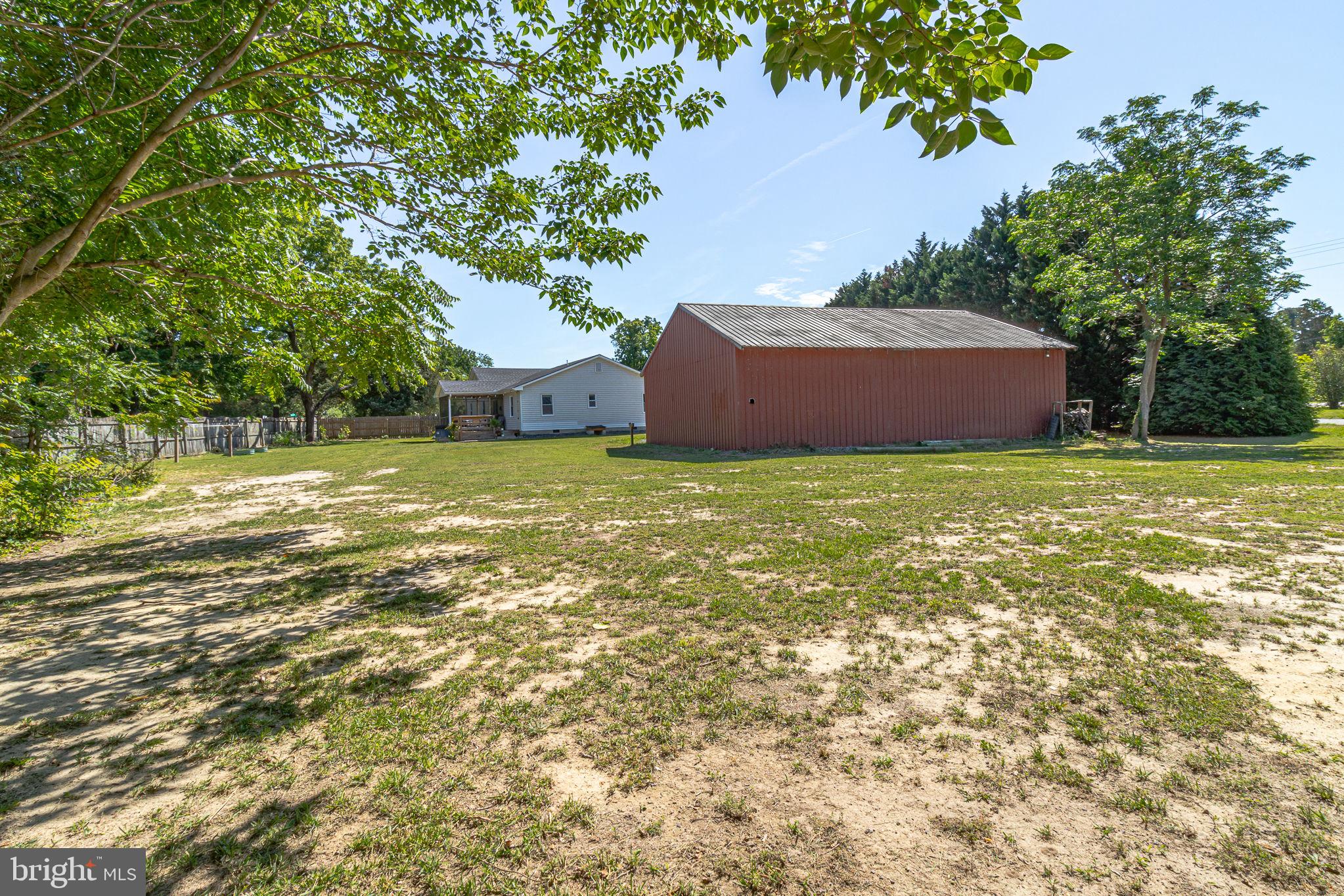 9832 River Road Lancaster, VA 22503 - Photo 57 of 68 Spacious yard with rustic barn charm.