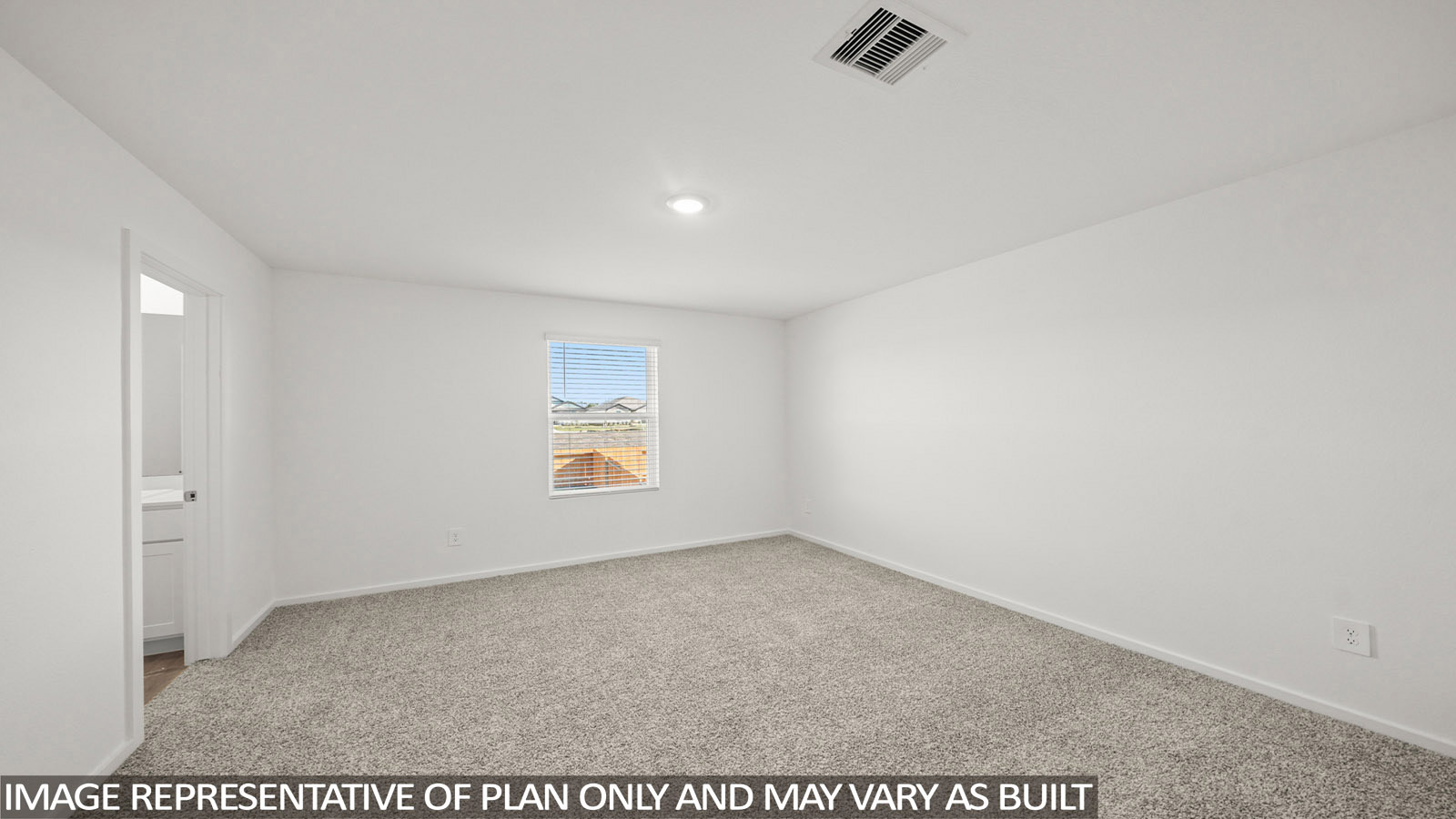 116 Baby Calf Roping Road Jarrell, TX 76537 - Photo 14 of 23 A well-lit bedroom features plush carpeting and a bright window with horizontal blinds.