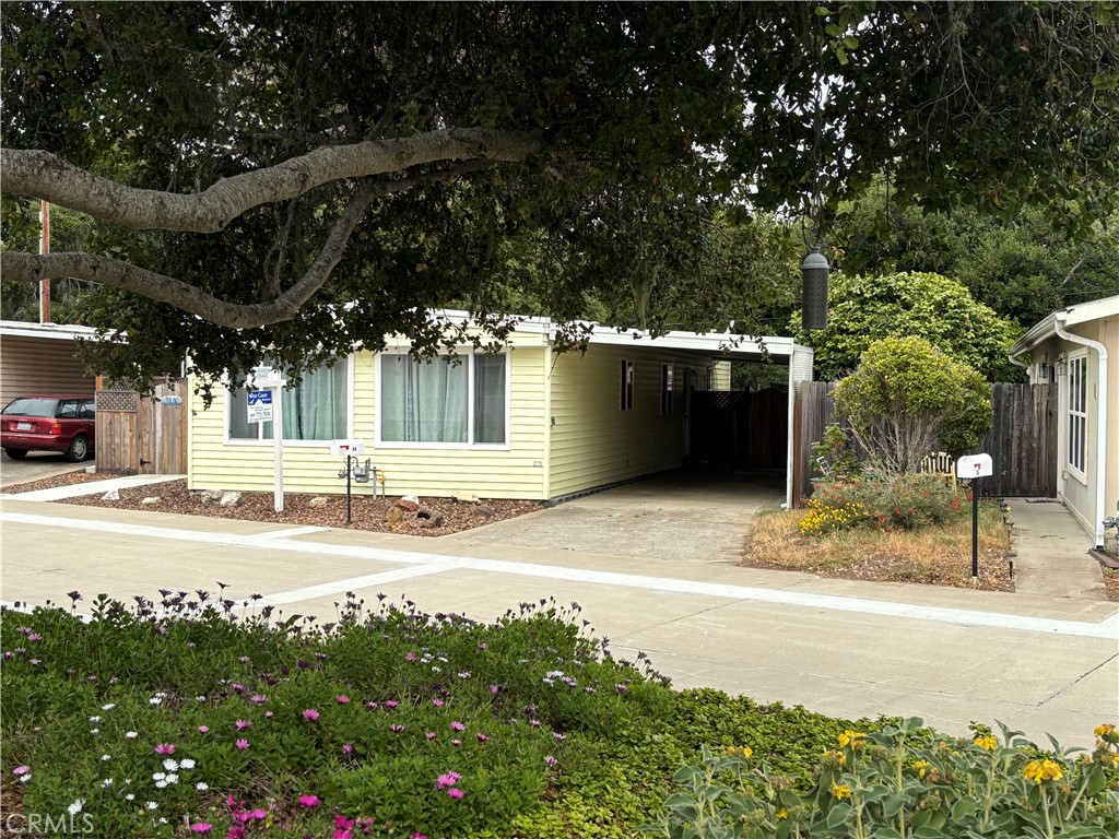 1595 Los Osos Valley Road, Unit 4A Los Osos, CA 93402 - Photo 1 of 32 a view of a parking area