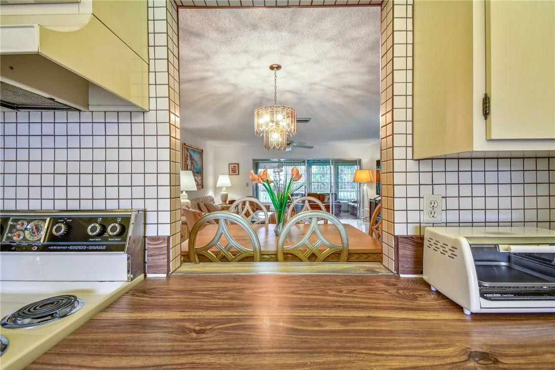 5348 Privet Place, Unit D Delray Beach, FL 33484 - Photo 14 of 60 a view of a entryway door of the house