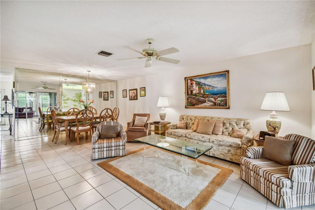5348 Privet Place, Unit D Delray Beach, FL 33484 - Photo 19 of 60 a living room with furniture and a view of living room