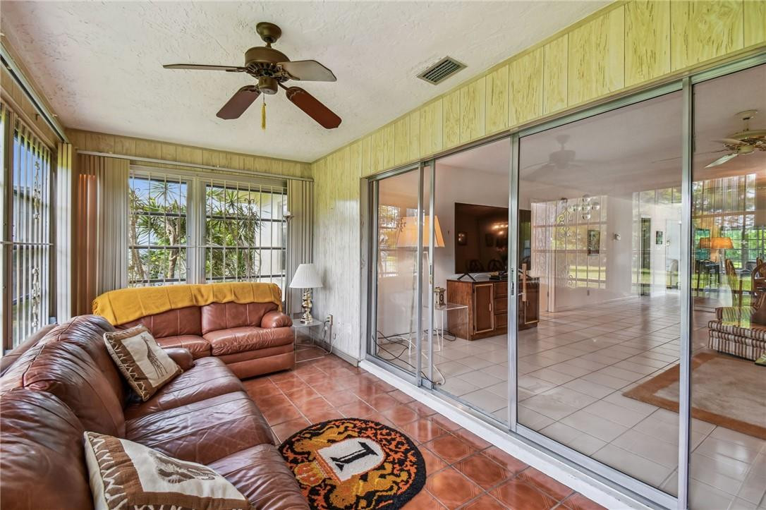 5348 Privet Place, Unit D Delray Beach, FL 33484 - Photo 21 of 60 a living room with furniture