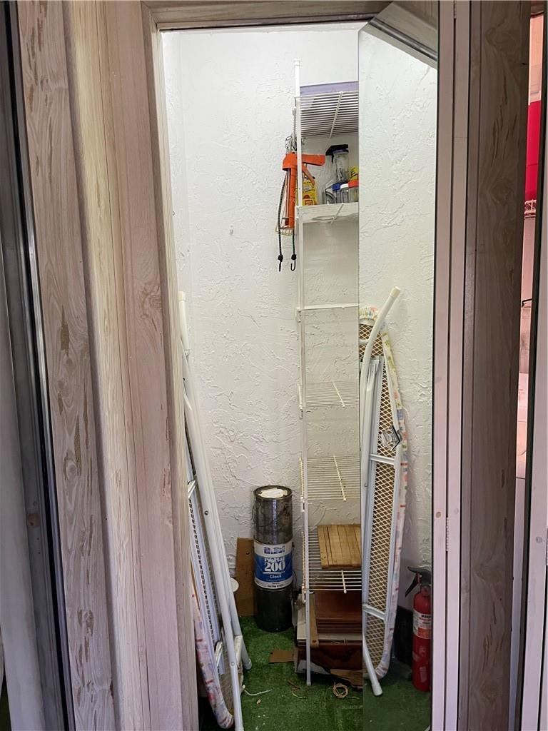 5348 Privet Place, Unit D Delray Beach, FL 33484 - Photo 25 of 60 a bathroom with a sink and a shower