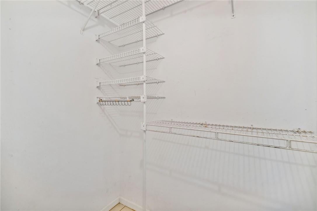 5348 Privet Place, Unit D Delray Beach, FL 33484 - Photo 40 of 60 a view of a room with racks on the wall