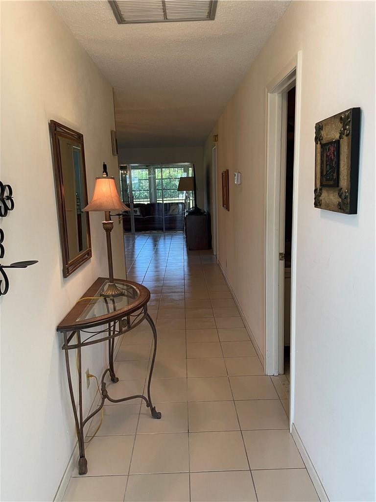 5348 Privet Place, Unit D Delray Beach, FL 33484 - Photo 4 of 60 a living room with furniture