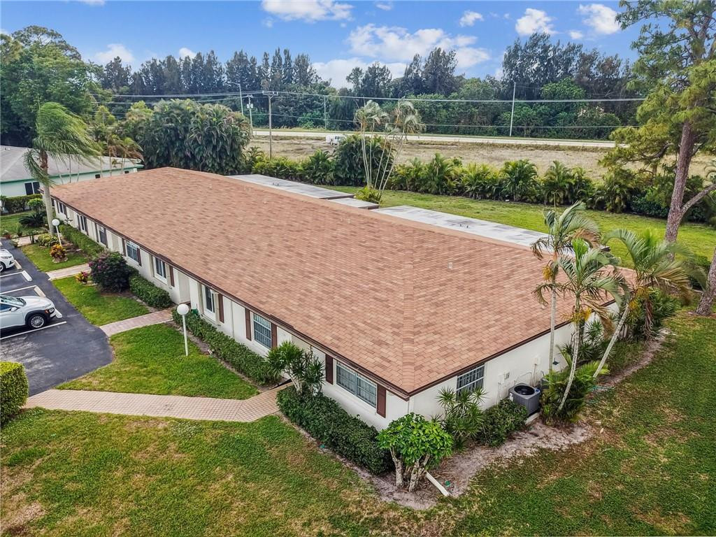 5348 Privet Place, Unit D Delray Beach, FL 33484 - Photo 46 of 60 an aerial view of a house having yard and lake view