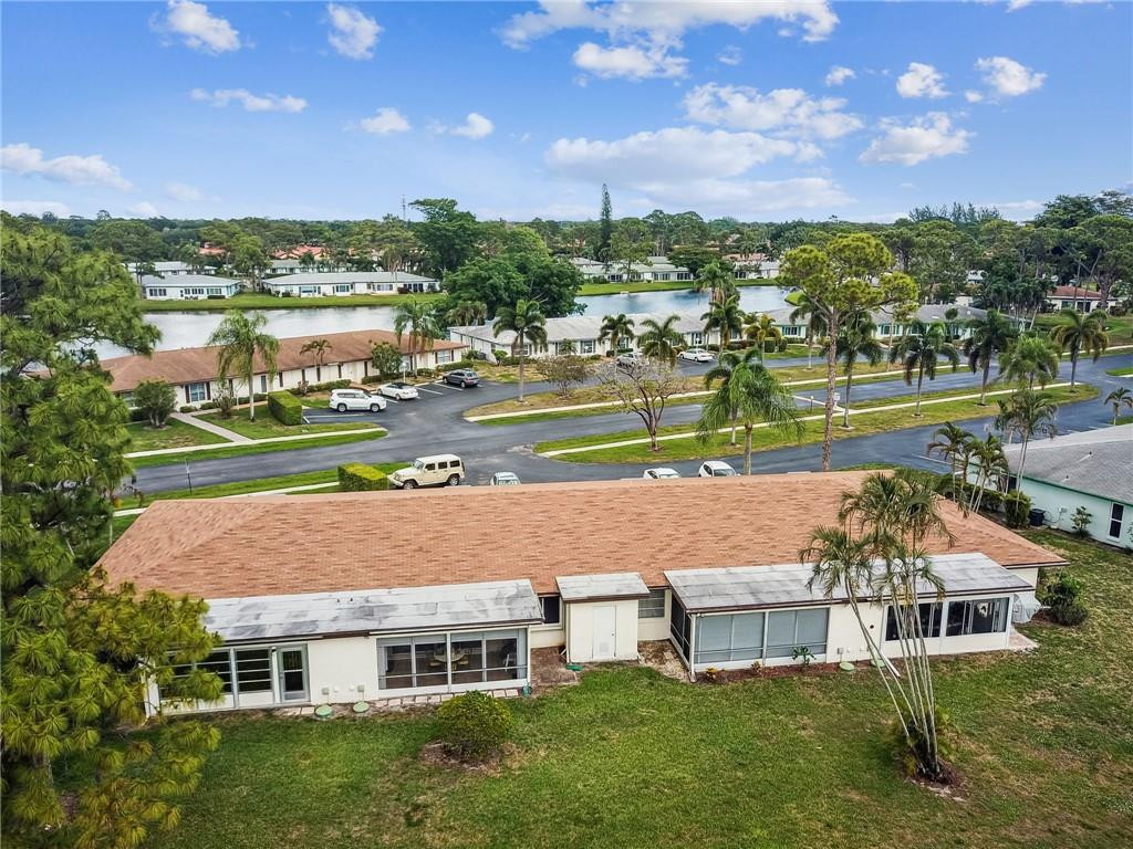 5348 Privet Place, Unit D Delray Beach, FL 33484 - Photo 47 of 60 a aerial view of a house with a yard
