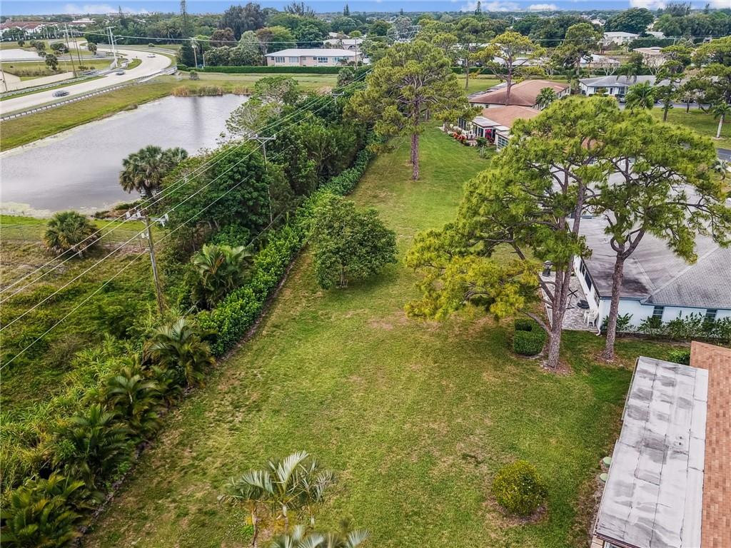 5348 Privet Place, Unit D Delray Beach, FL 33484 - Photo 48 of 60 a view of a lake with houses