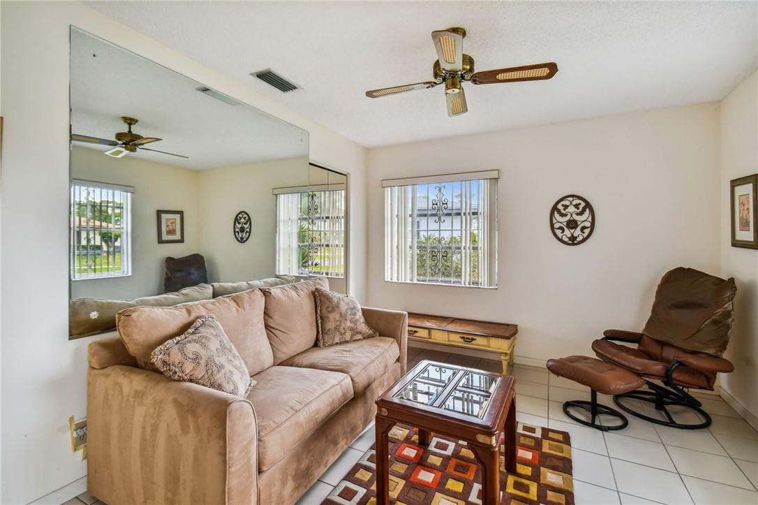 5348 Privet Place, Unit D Delray Beach, FL 33484 - Photo 5 of 60 a living room with furniture