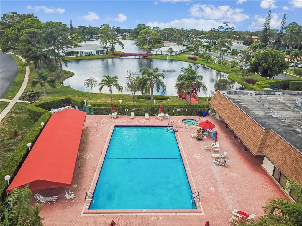 5348 Privet Place, Unit D Delray Beach, FL 33484 - Photo 53 of 60 swimming pool view with a lake view
