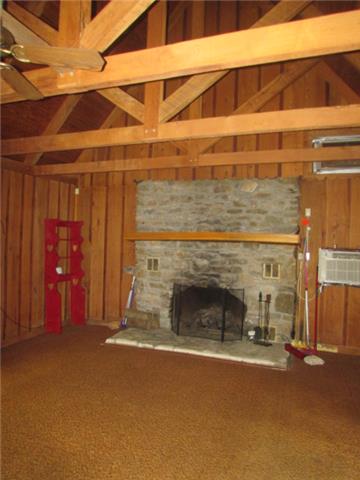 903 Fall River Road Lawrenceburg, TN 38464 - Photo 15 of 17 Another view of the inviting Great Room and wood burning fireplace.