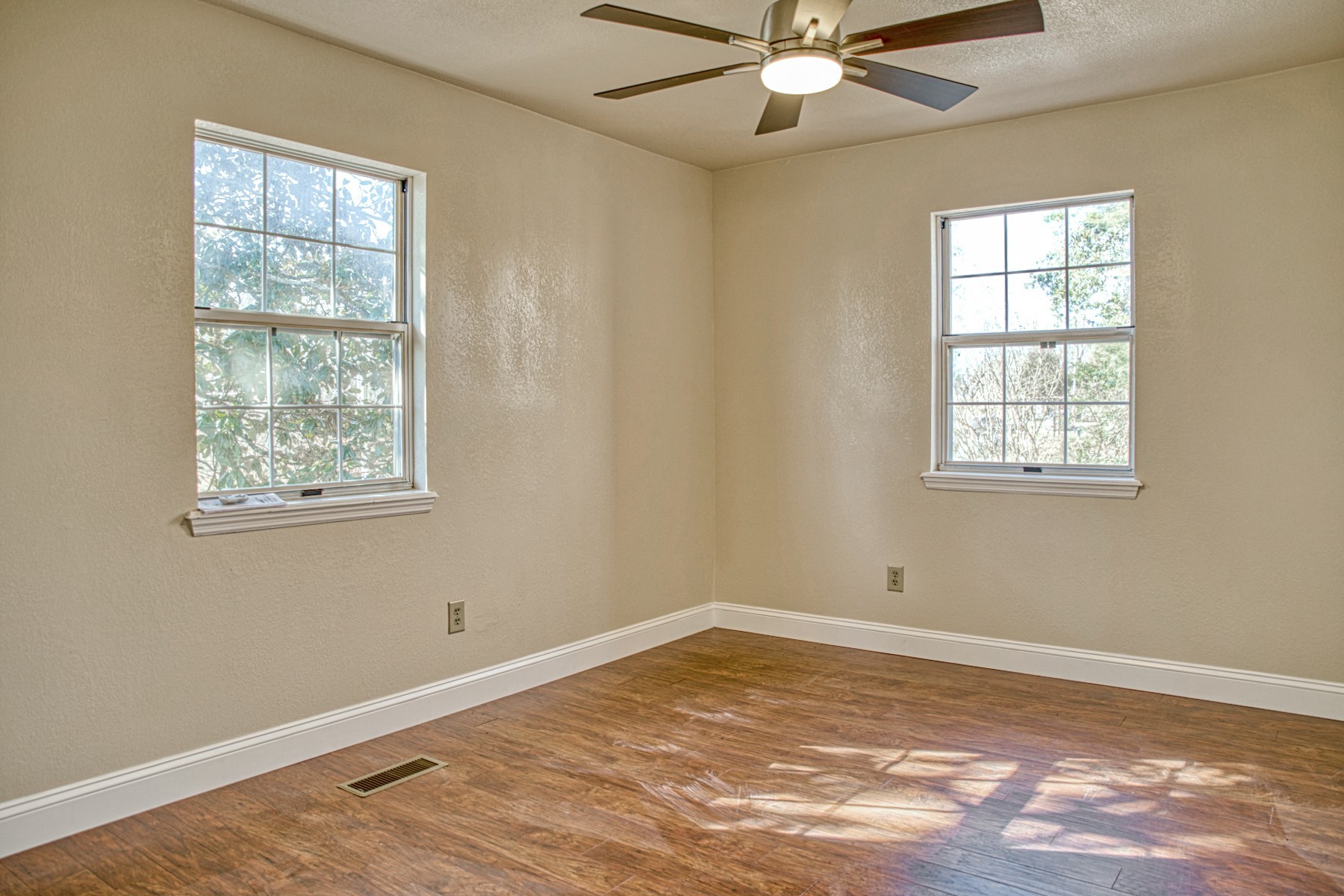 1770 Post Oak Road Cookeville, TN 38506 - Photo 16 of 39 PRIMARY BEDROOM WITH NEW WOOD FLOORING, NEW CEILING FAN, FRESHLY PAINTED